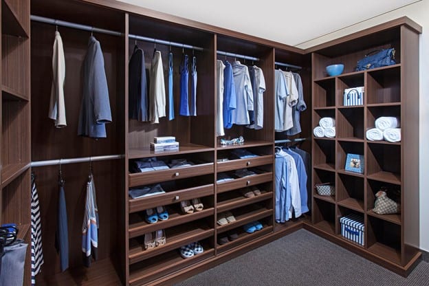 A custom walk-in Brio Collection closet from Closets by Design.