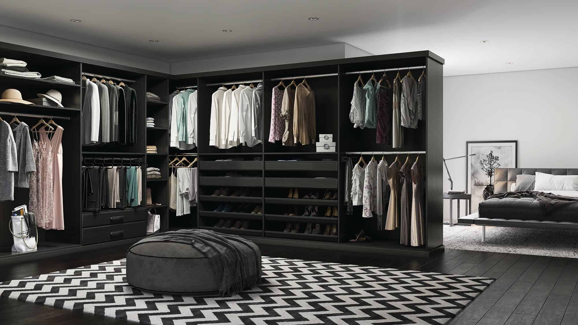 A walk-in closet with on-trend black and white decor.