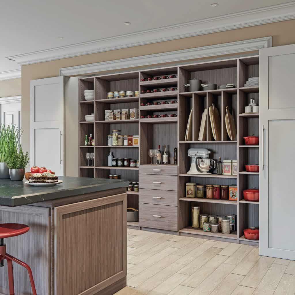 A custom pantry set into a wall from Closets by Design.