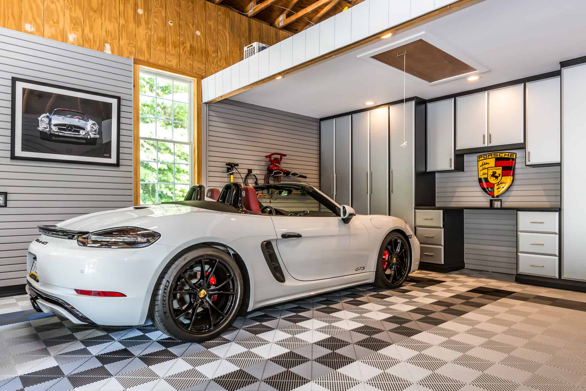 Car parked in a organized garage