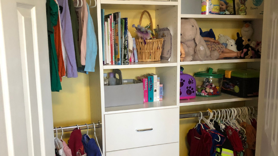 A child's closet organized with tips from Closets by Design.